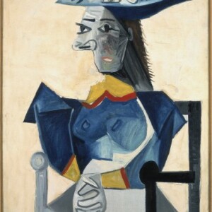 Femme assise au Chapeau en forme de poisson Picasso